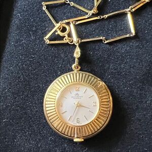 Rare Bucherer Gold plated ladies pendant watch. Works